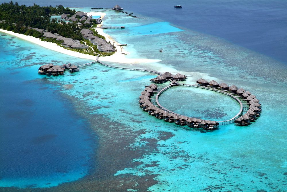 Aerial view of Coco Bodu Hithi and its surrounding lagoon