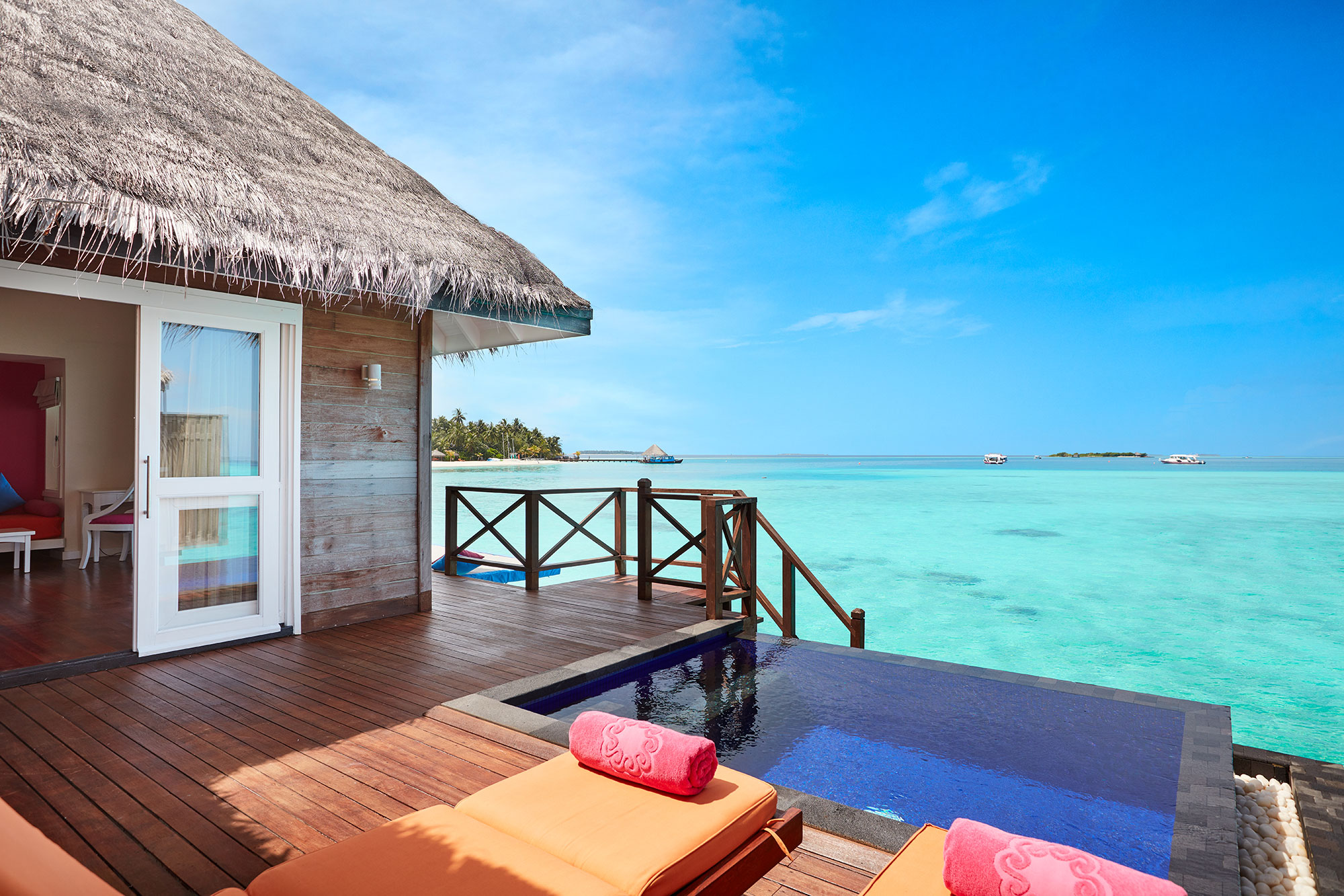 Overwater villa pool deck at Sun Siyam Vilu Reef